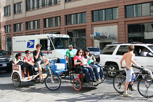 SXSW 2011 Pedicabs in traffic