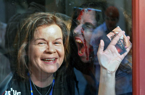 Debbie battles a zombie