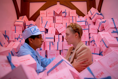 Still of Saoirse Ronan and Tony Revolori in The Grand Budapest Hotel